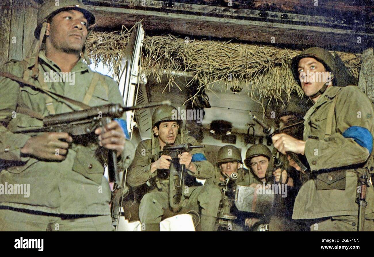 THE DIRTY DOZEN 1967 MGM film with Jim Brown at left and Donald Sutherland Stock Photo