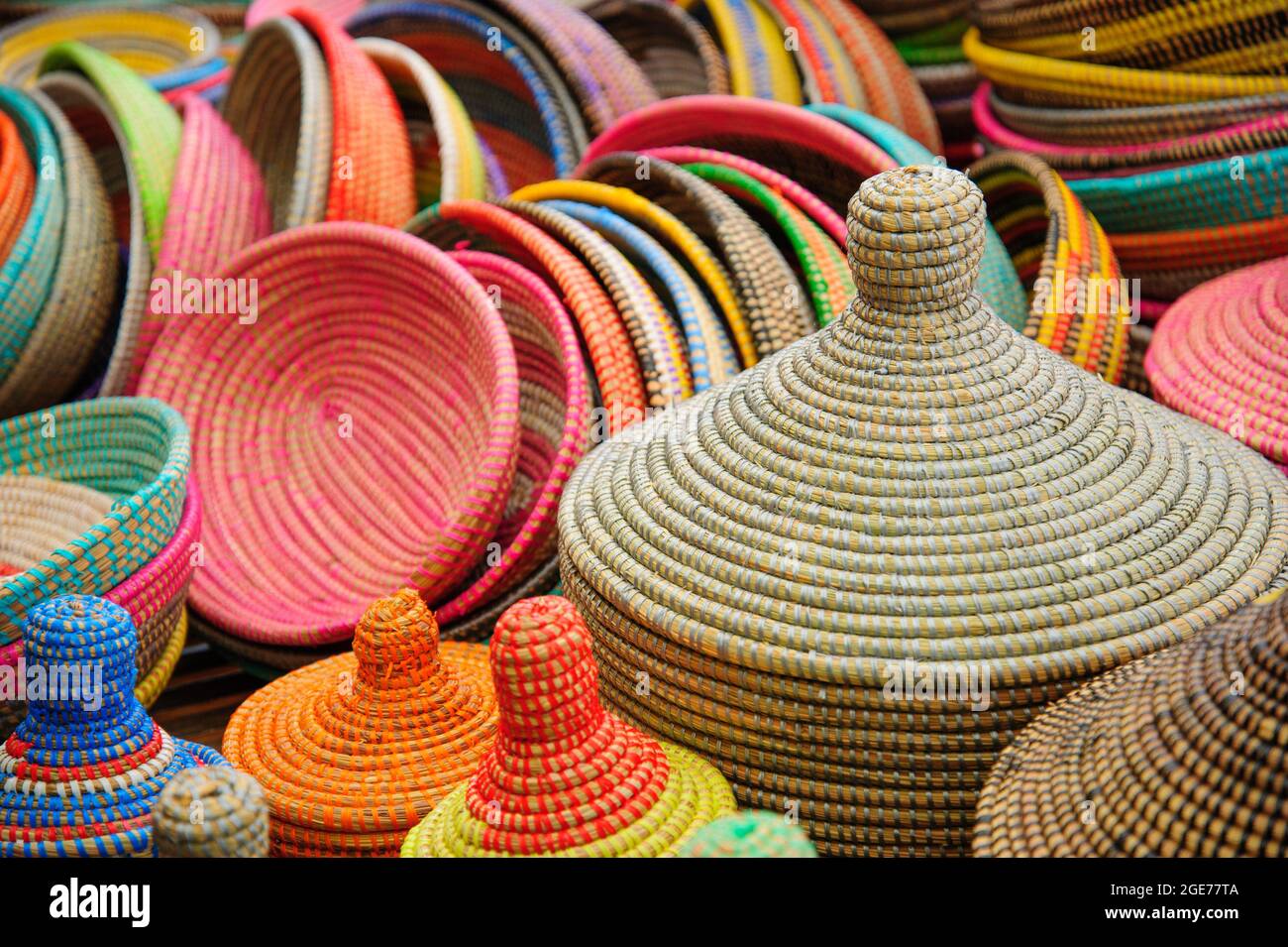 Colorful handmade baskets on the market. Stock Photo