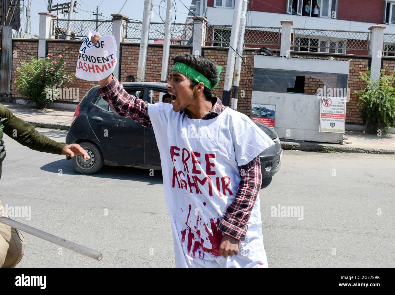 A Kashmiri Shiite mourners shouts religious slogans as government ...