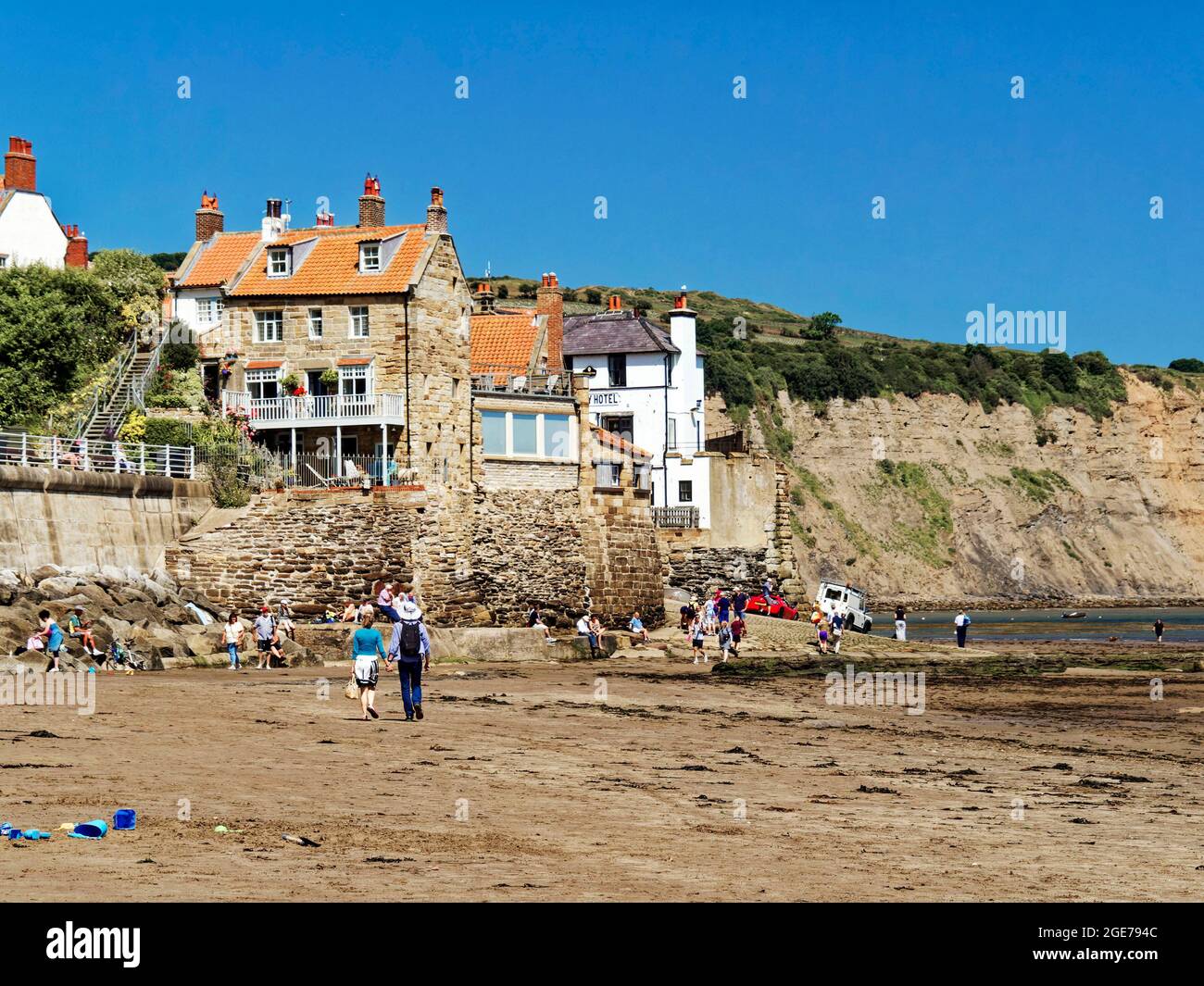Houses in Robin Hood's Bay, North Yorkshire cling to the edge of the