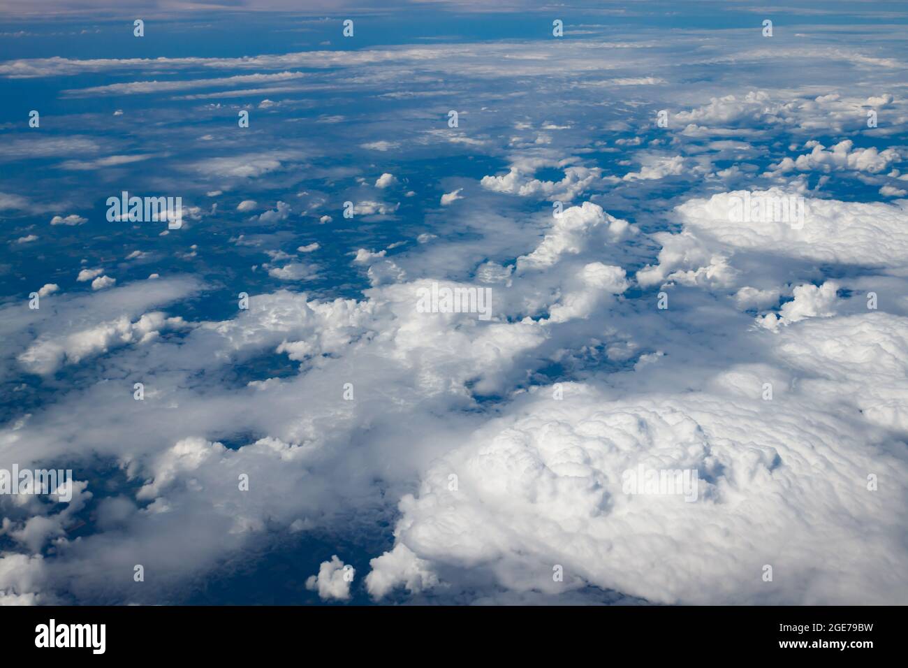 Aerial view to beautiful clouds from plane flight from helsinki to