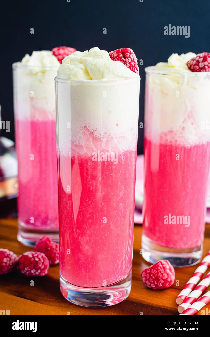Raspberry Italian Cream Sodas Made Topped with Whipped Cream and Frozen