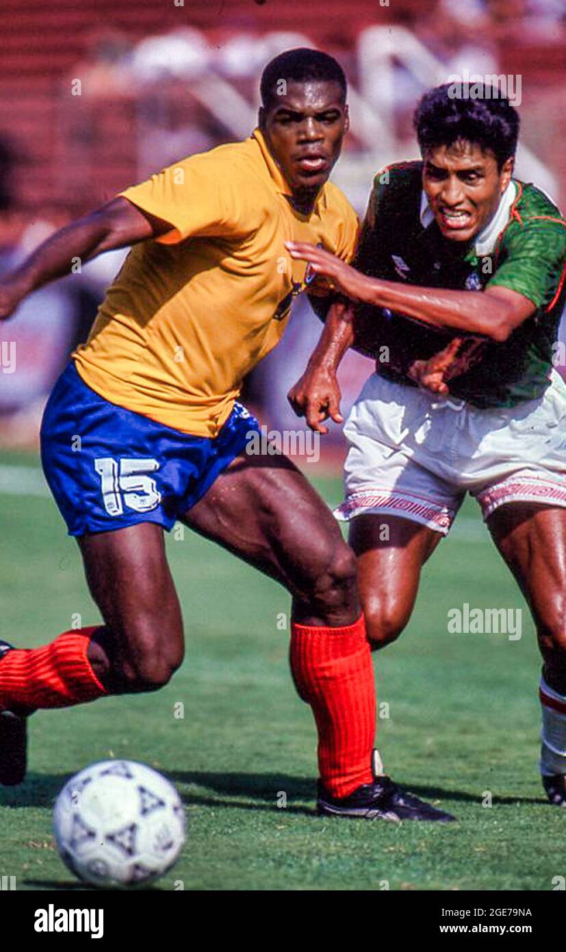 Freddie Rincon (15) of Colombia playing against Carlos Hermosillo of Mexico Stock Photo