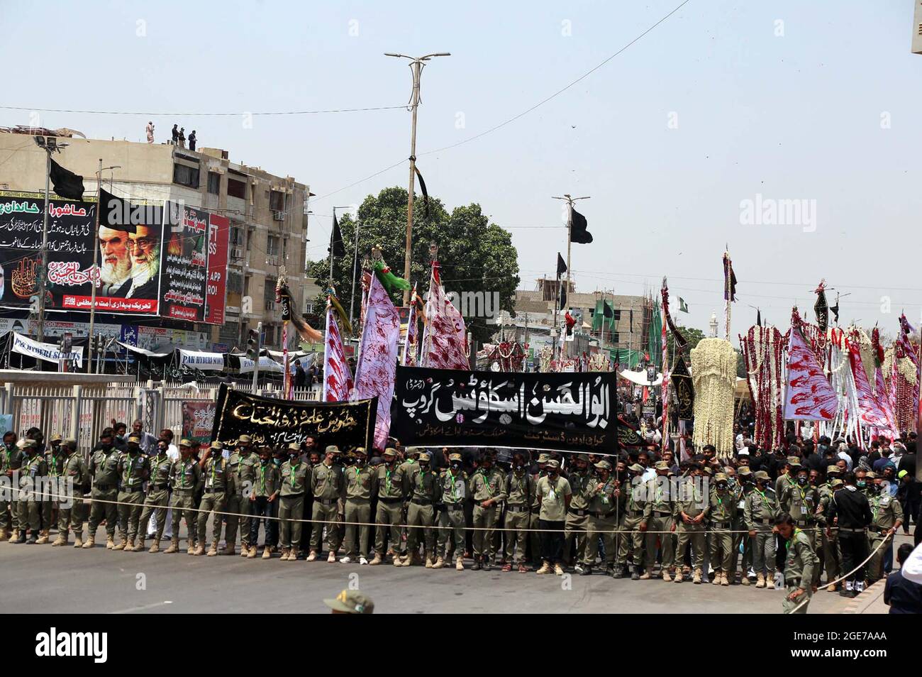 Shiite mourners of Imam Hussain (A.S) are participating in religious procession in memories of martyrdom of Hazrat Imam Hussain (AS), grandson of Prophet Mohammad (PBUH) in connection of the eighth Muharram-ul-Haram, at M.A Jinnah road in Karachi on Tuesday, August 17, 2021. Stock Photo