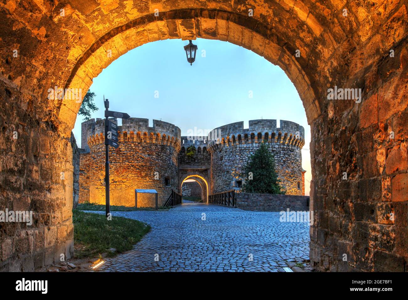 Night scene in Kalemegdan a large parc over the ruins of Belgrade fortress, Serbia featuring the Zindan Gate as seen from Leopold's Gate at sunset. Stock Photo