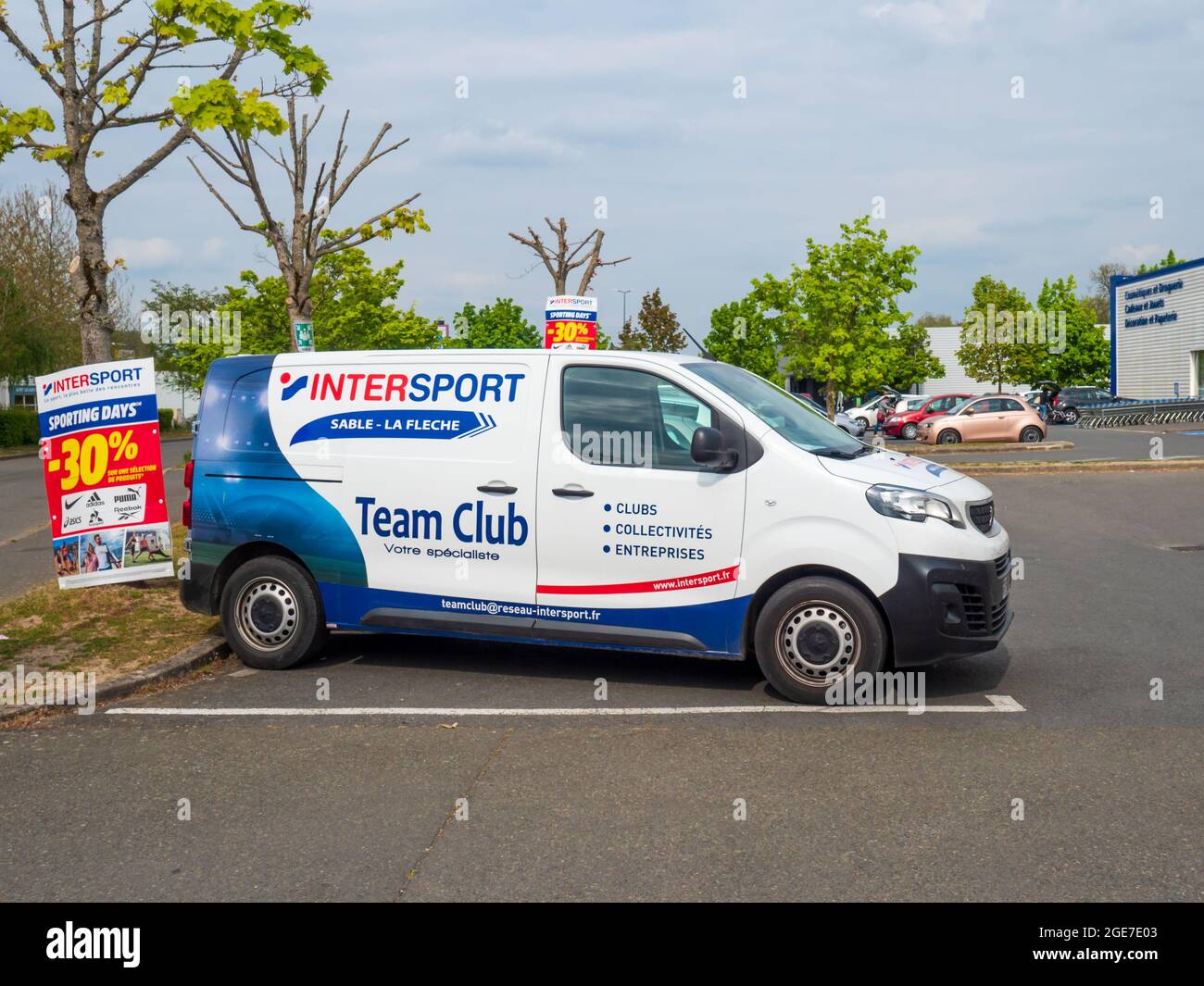 FLEC, FRANCE - Jul 30, 2021: A white van parked in a parking lot with  Intersport and team club text on it Stock Photo - Alamy