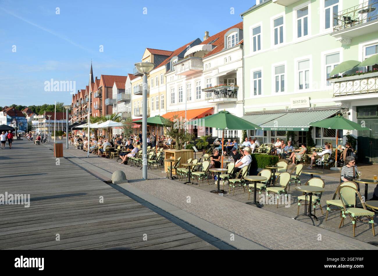 S�nderborg, Denmark - August 12, 2021: Outdoors caf�  life along S�ndre Havnegade at the harbour. Stock Photo