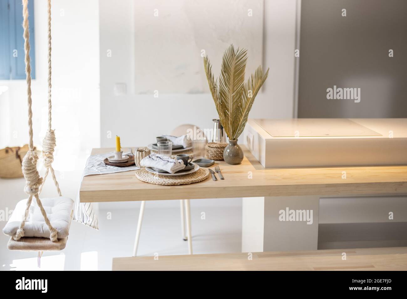 Served table for breakfast in a modern apartment Stock Photo
