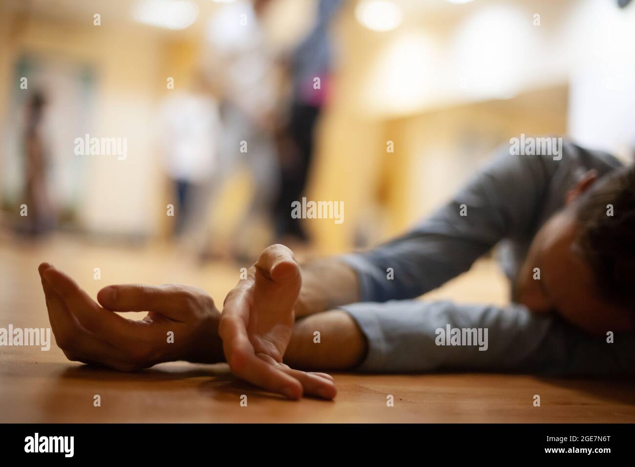 dancer laying on floor dancers improvise in contact Stock Photo