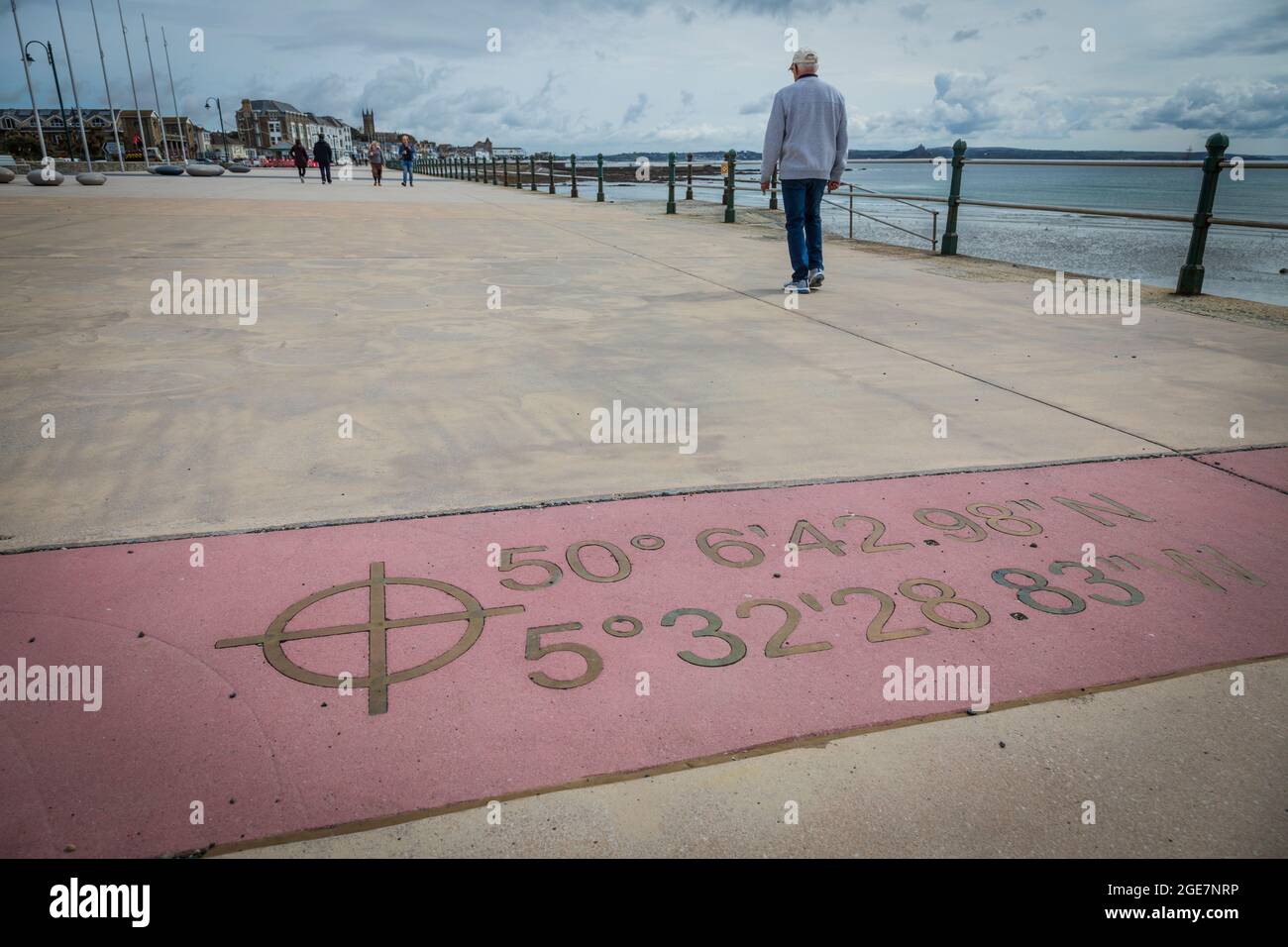 Marking of longitude and latitude on the promenade at Penzance, Cornwall, England. Stock Photo