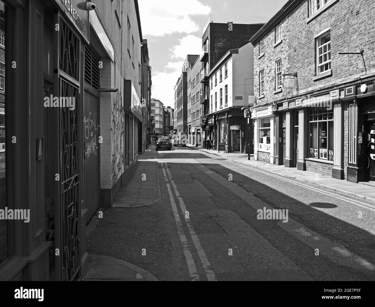 MANCHESTER. GREATER MANCHESTER. ENGLAND. 07-15-21. Tib Street in the city's Northern Quarter, shop fronts and businesses. Stock Photo