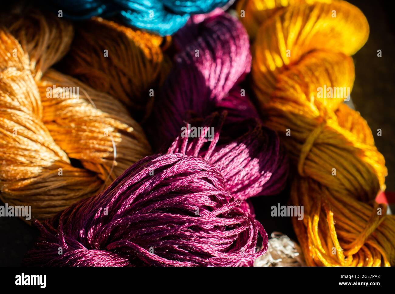 Colorful strands of silk thread close up texture background Stock Photo ...
