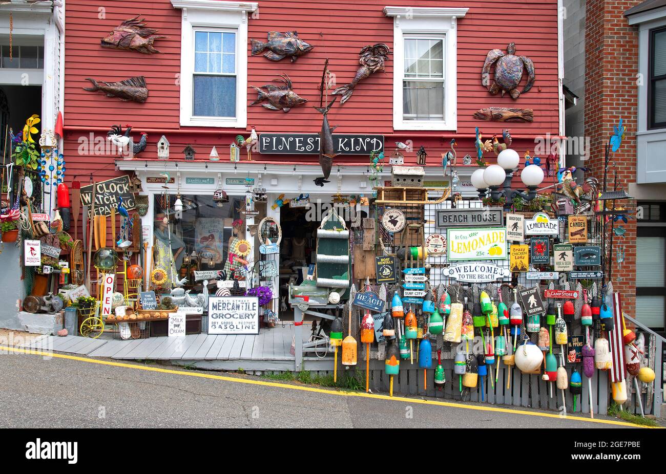 A shop with items for sale on display in downtown Boothbay Harbor