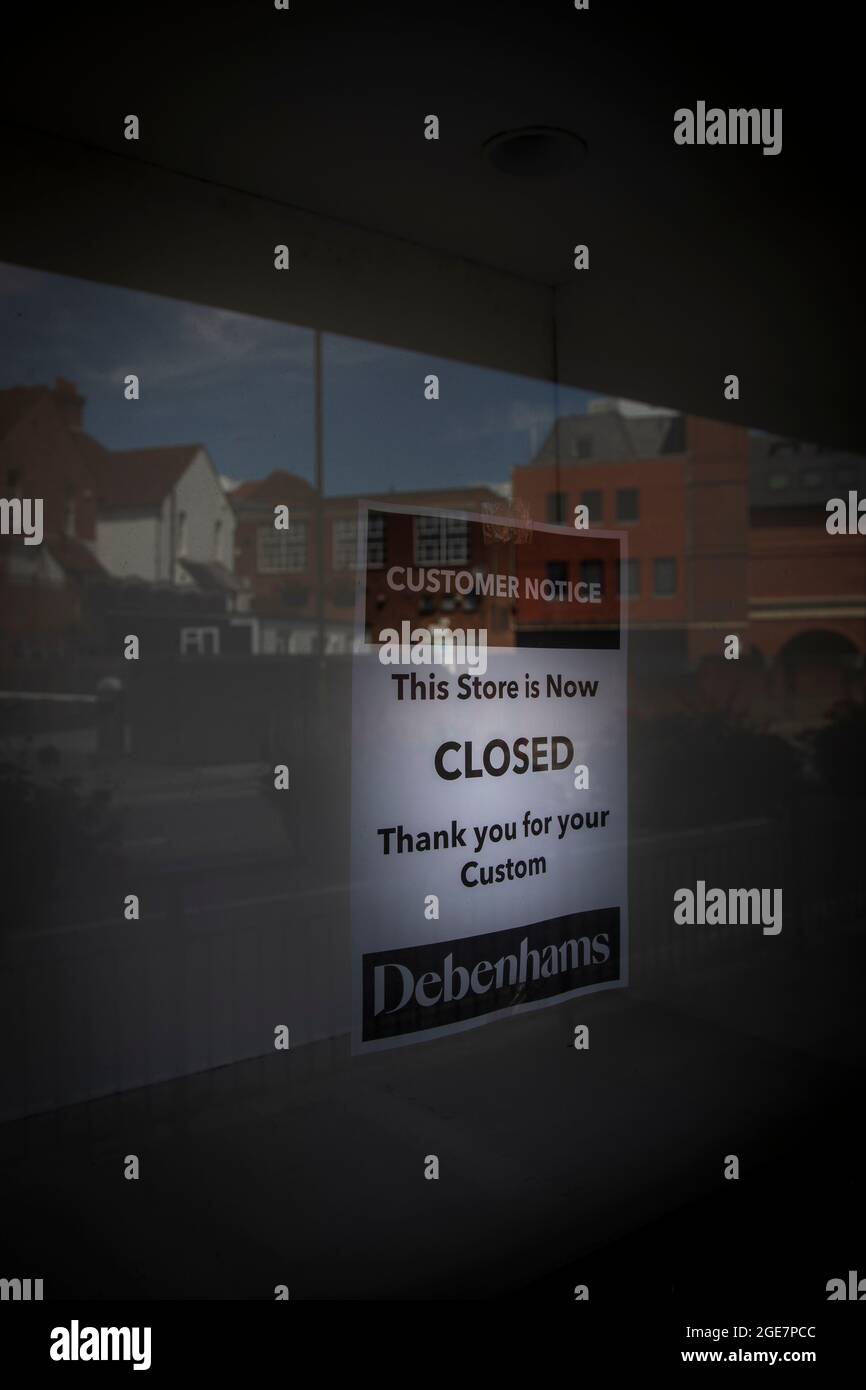 Thank you notice in the window of the Debenhams store in Guildford after closing for the final time. Stock Photo