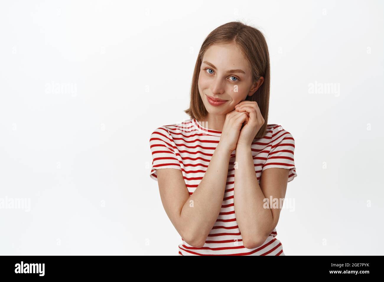 Portrait of tender and beautiful young woman with blond hair, no makeup ...