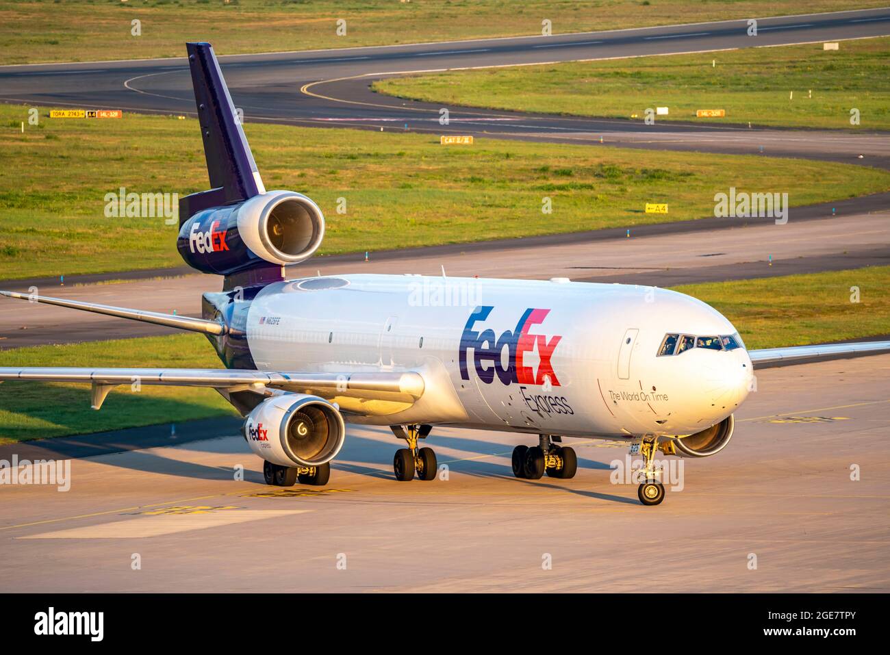 Cologne-Bonn Airport, CGN, FedEX cargo plane MD11 after landing, taxiing to cargo centre, NRW, Germany, Stock Photo