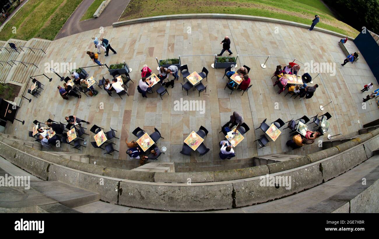 Edinburgh, Scotland, 17th  August, 2021. UK  Weather: Sunny day saw Outdoor seating at the  vew cafe National Gallery of Scotland cafe and restaurant  overlooking princes street gardens Festival Fringe street return as   happy locals and tourists enjoy sitting in the sun and a little humour and fun  in the city . Credit Gerard Ferry/Alamy Live News Stock Photo