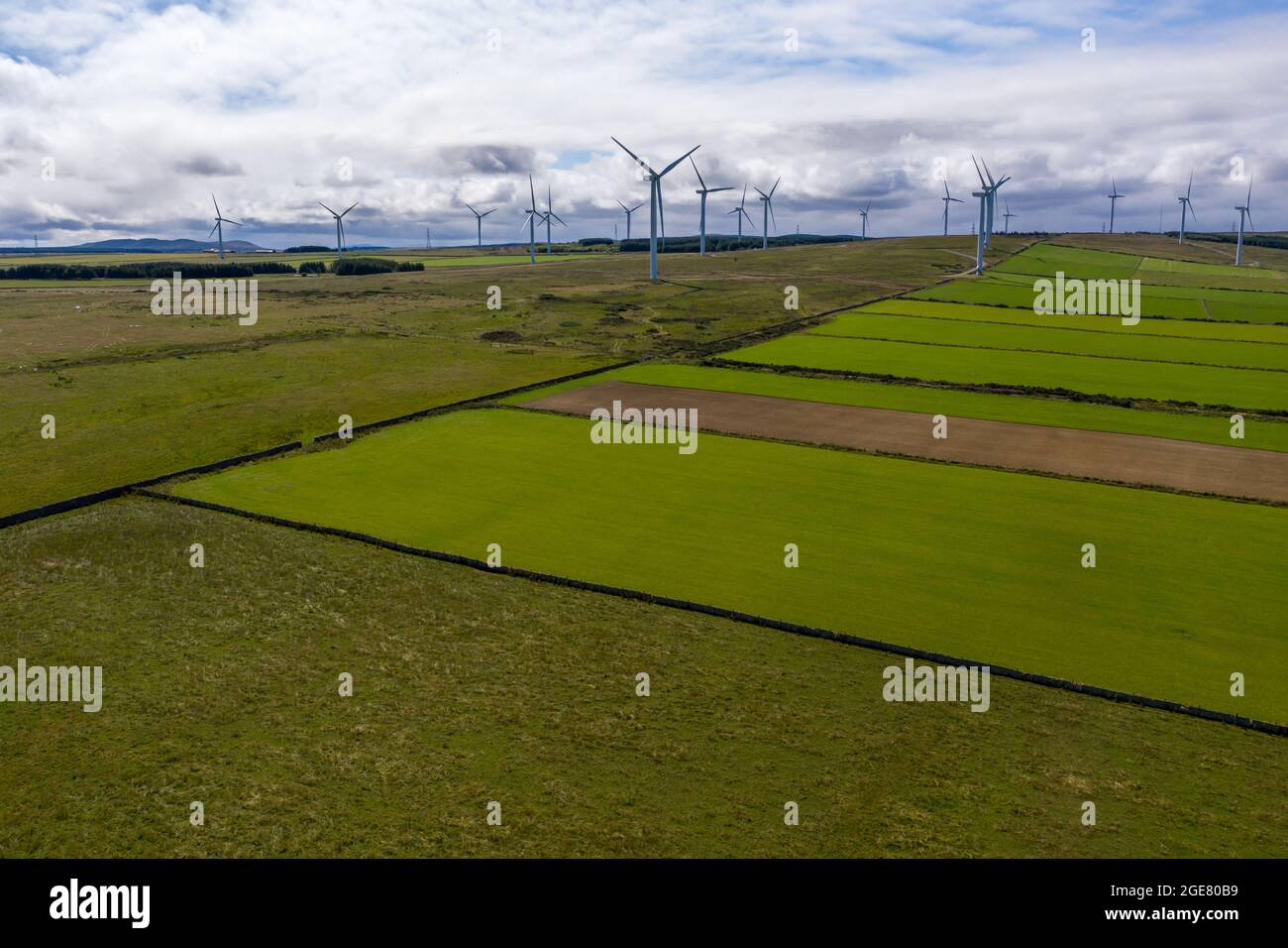 Wind turbines power generator farm in the highlands Scotland. Alternative green clean renewable sustainable energy, ecology. Stock Photo