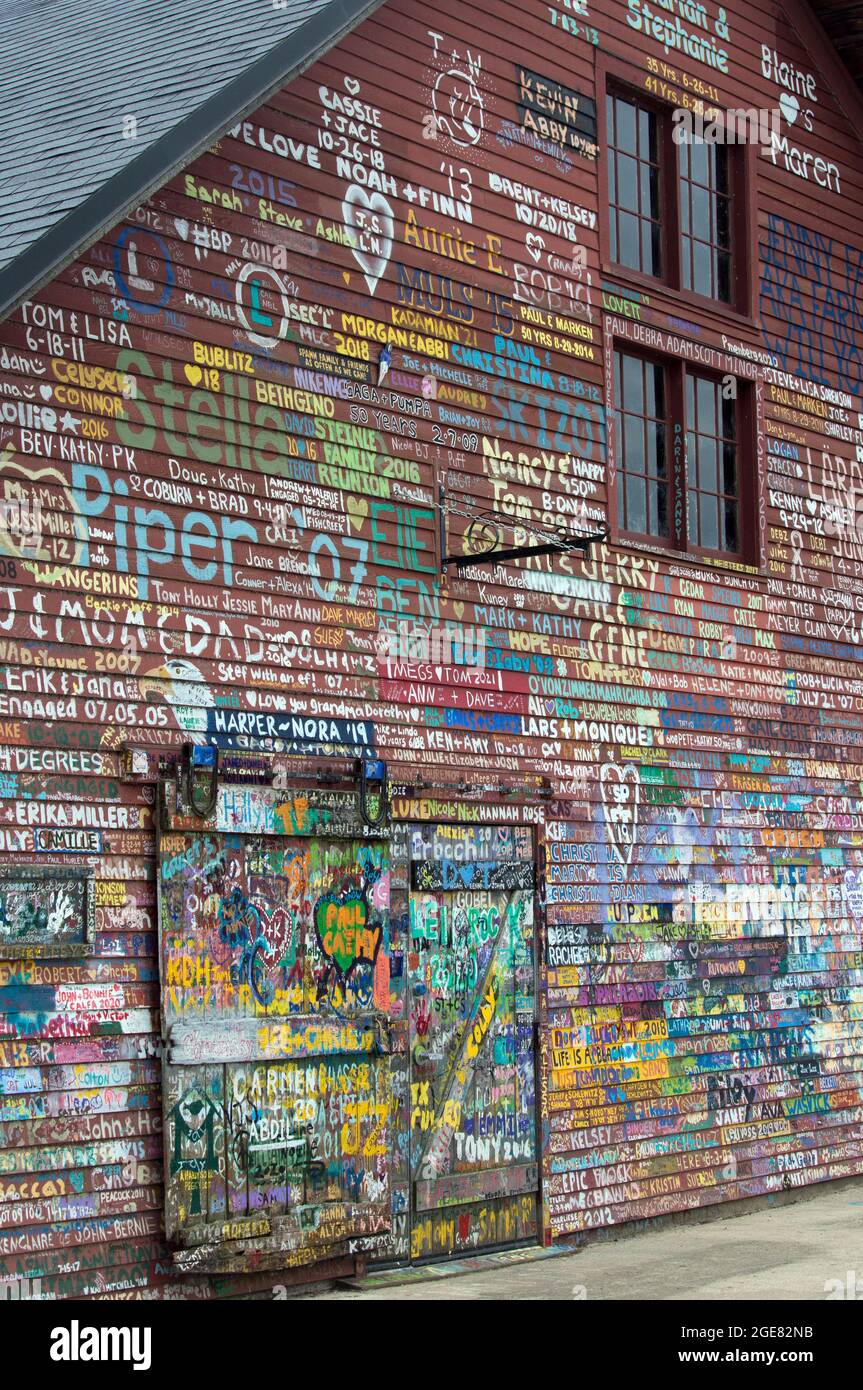 close up of some of the graffiti covering the Hardy Gallery barn at Anderson Dock in Ephraim, Door County, Wisconsin Stock Photo