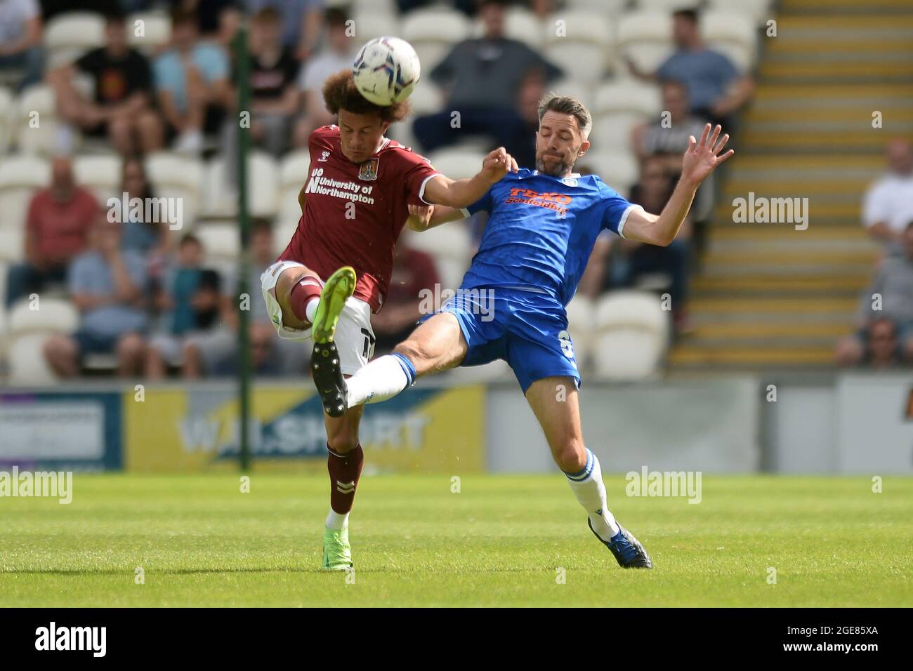 Cole Skuse of Colchester United does battle with Shaun McWilliams of Northampton Town - Colchester United v Northampton Town, Sky Bet League Two, JobServe Community Stadium, Colchester, UK - 14th August 2021  Editorial Use Only - DataCo restrictions apply Stock Photo