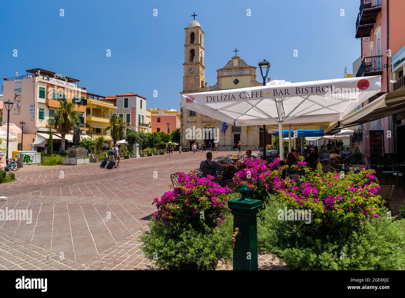 CHANIA, CRETE - JULY 22 2021: Crowds of tourists in the narrow streets of Chania old town on the Greek island of Crete. Despite the Coronavirus pandem Stock Photo