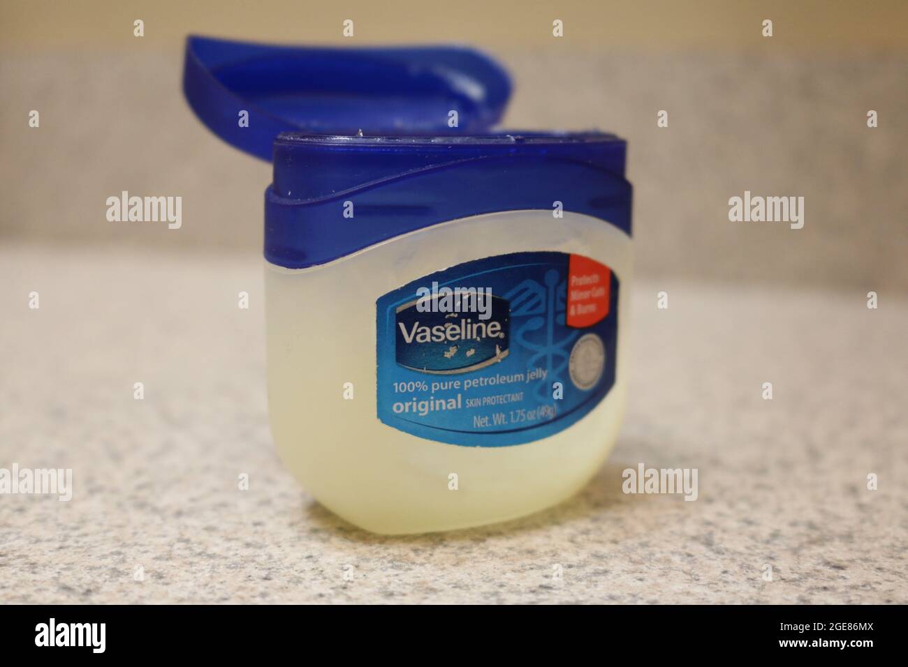 Vaseline tub with an open lid Stock Photo Alamy