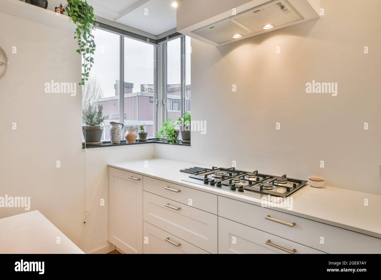 Kitchen of an apartment with modern furniture Stock Photo - Alamy