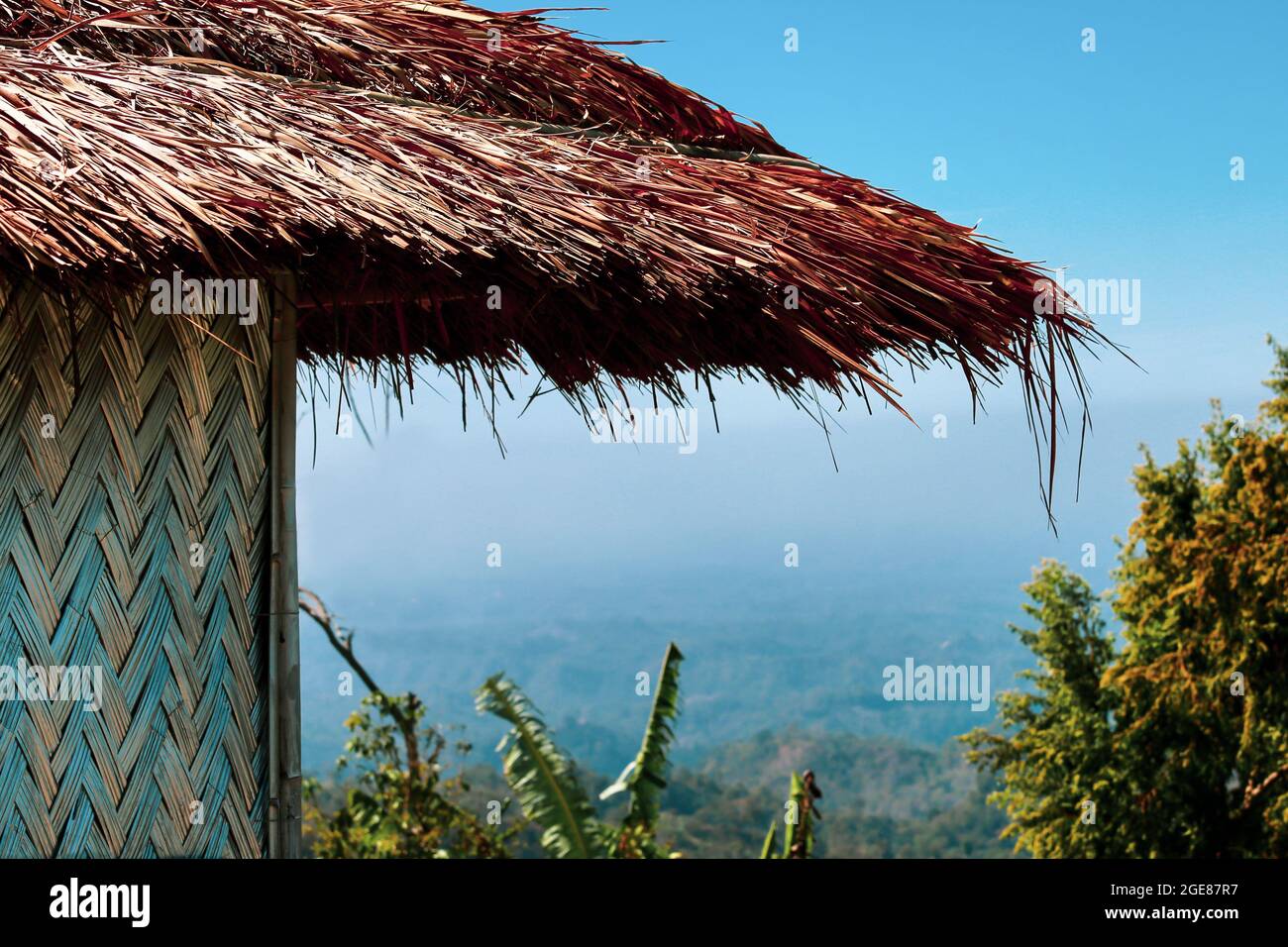 Traditional grass thrashed house in hill tracts Bandarban of Bangladesh Stock Photo