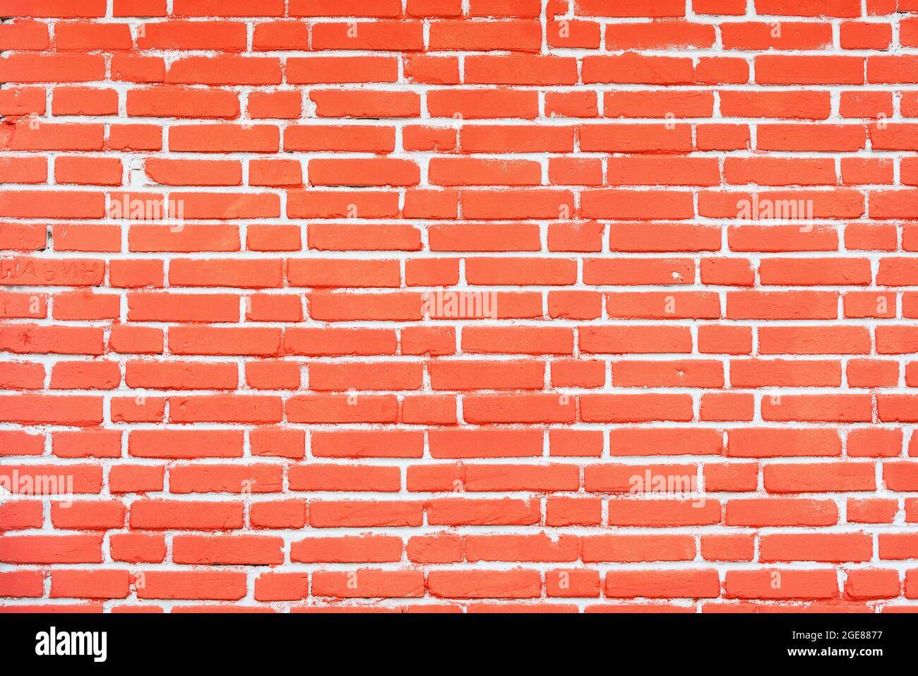 Red brick wall and stone floor background. Stock Photo