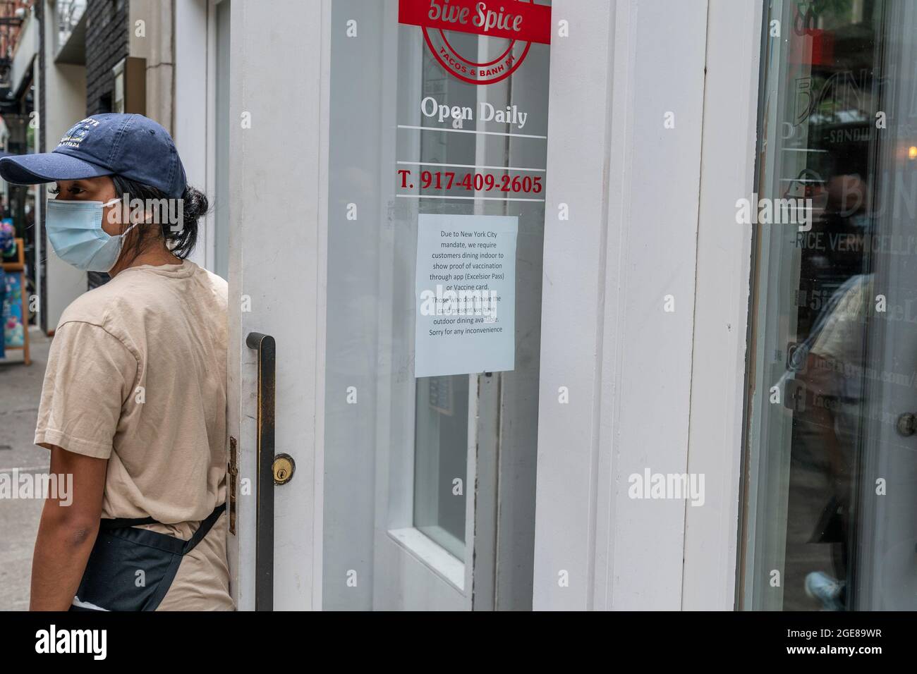 New York, United States. 17th Aug, 2021. View of 5ive Spice restaurant on 1st day of vaccine mandate for indoor dining on order by mayor of the city in New York on August 17, 2021. Notice posted on the doors advising about new rules for indoor dining. (Photo by Lev Radin/Sipa USA) Credit: Sipa USA/Alamy Live News Stock Photo