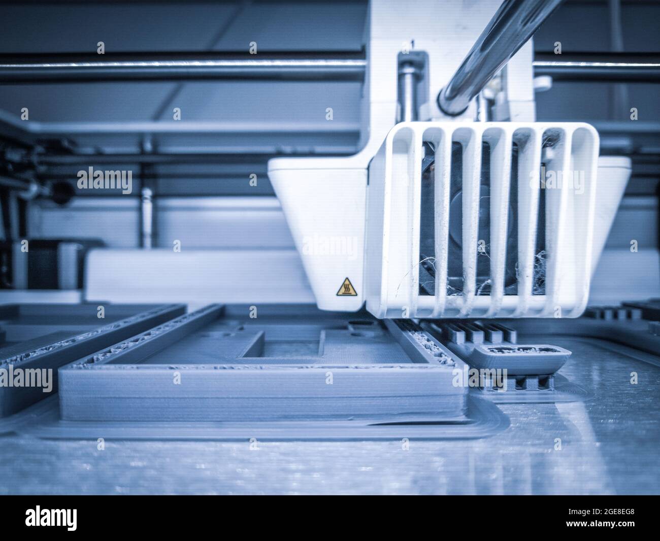 3D printer, printing with plastic wire filament in additive manufacturing technique. Stock Photo