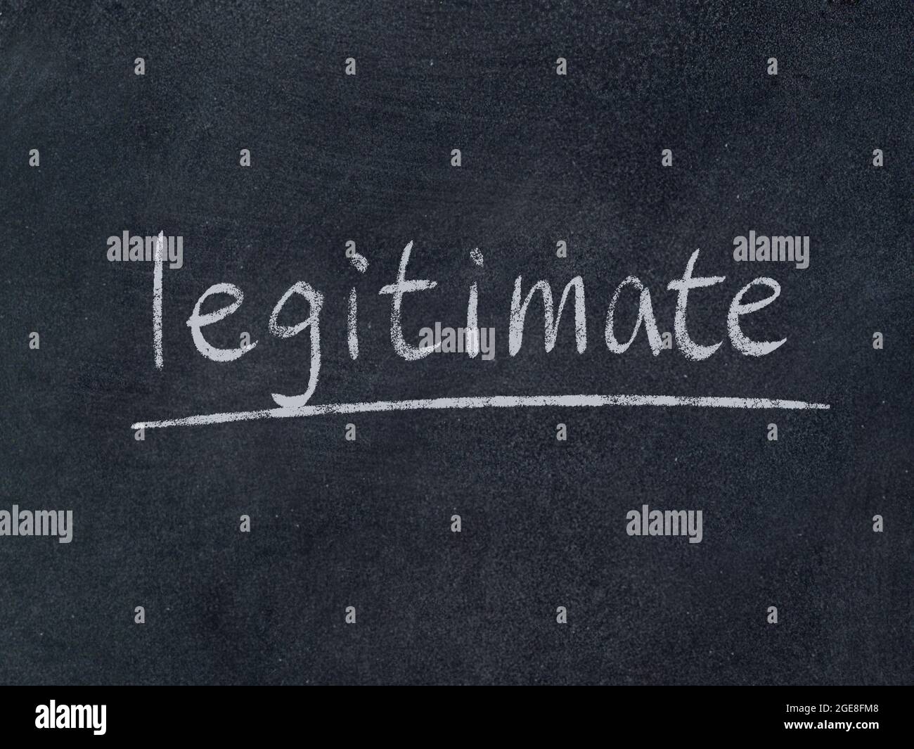 legitimate concept word on blackboard background Stock Photo Alamy