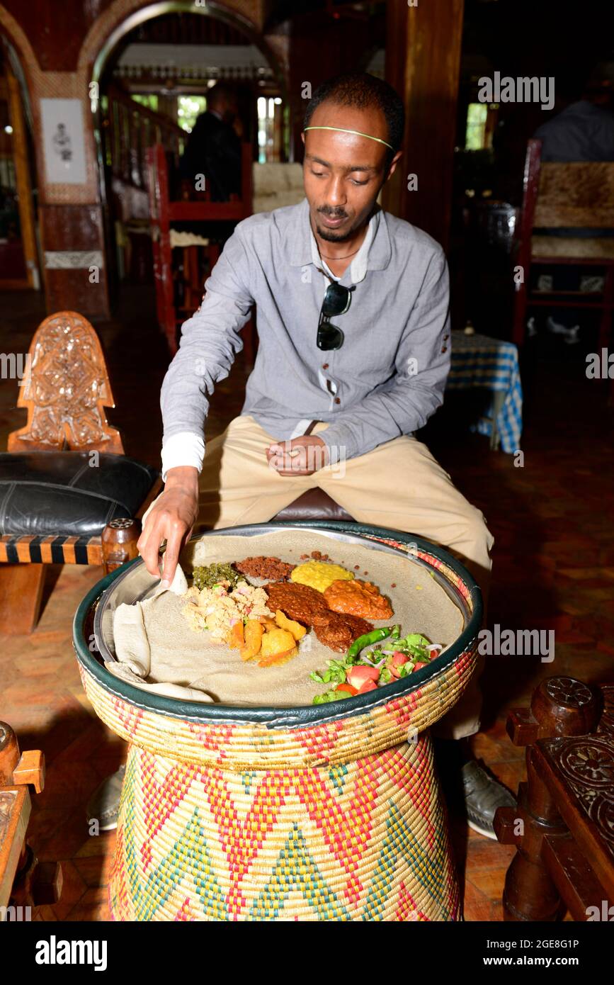 Ethiopian restaurant eating hi-res stock photography and images - Alamy