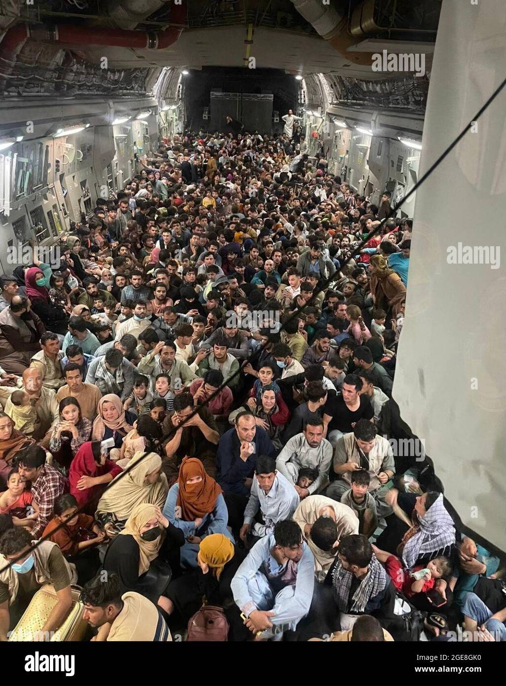 Approximately 640 Afghan citizens pack inside a United States Air Force C-17 Globemaster III, to be safely transported from Hamid Karzai International Airport in Afghanistan, Sunday, August 15, 2021. Photo by Chris Herbert/U.S. Air Force via CNP/ABACAPRESS.COM Stock Photo