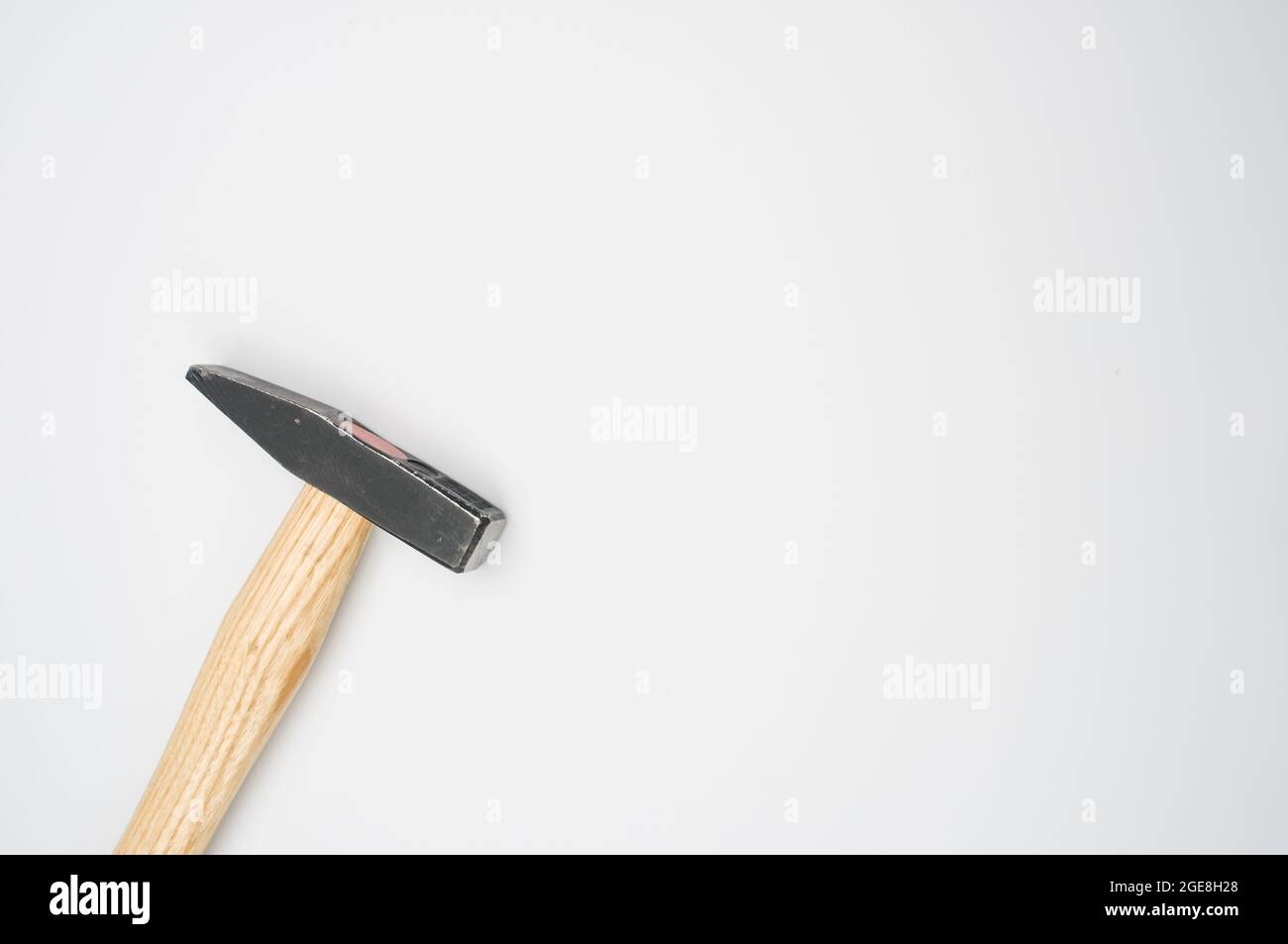 Machinist hammer with wooden handle isolated on a white background with ...