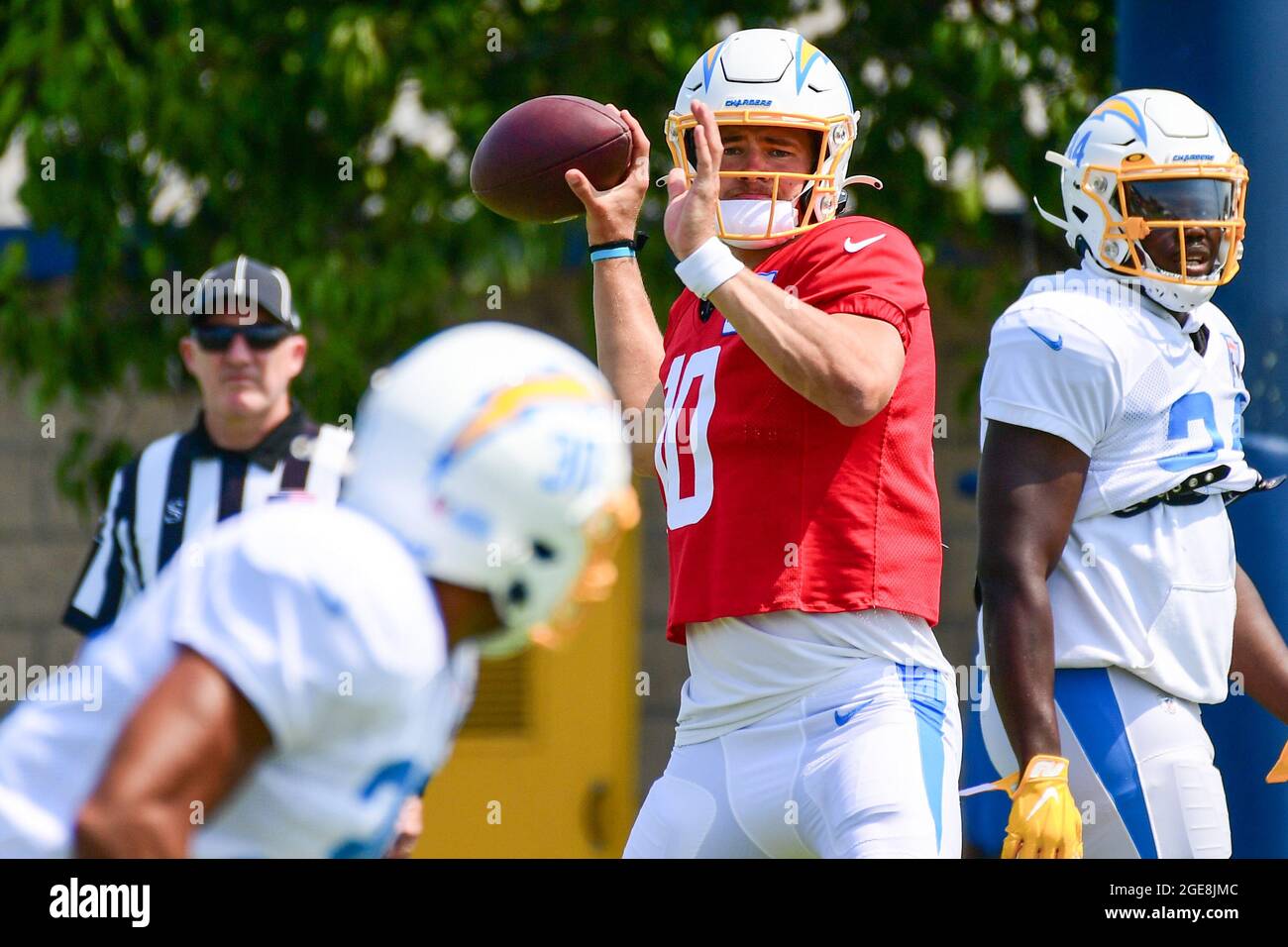 Los Angeles Chargers quarterback Justin Herbert (10) throws the ball to running back Austin Ekeler (30) during training camp on Tuesday, Aug 17, 2021, Stock Photo