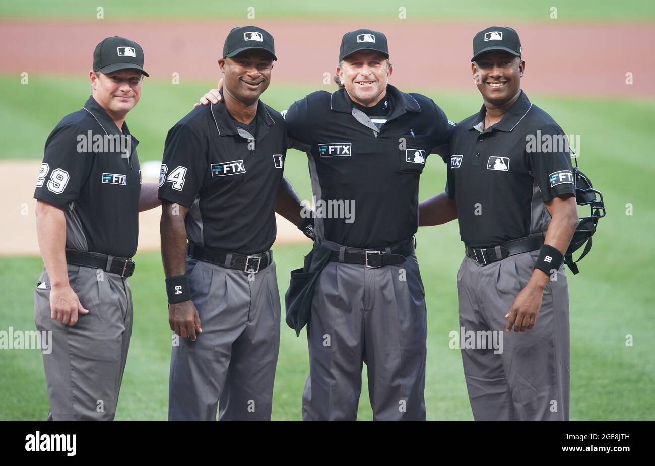 St. Louis, United States. 18th Aug, 2021. Major League Umpires (L to R) Sean Barber, Alan Porter, Chris Guccione and Ramon DeJesus pose for a photograph before the Milwaukee Brewers-St. Louis Cardinals baseball game at Busch Stadium in St. Louis on Tuesday, August 17, 2021. Photo by Bill Greenblatt/UPI Credit: UPI/Alamy Live News Stock Photo