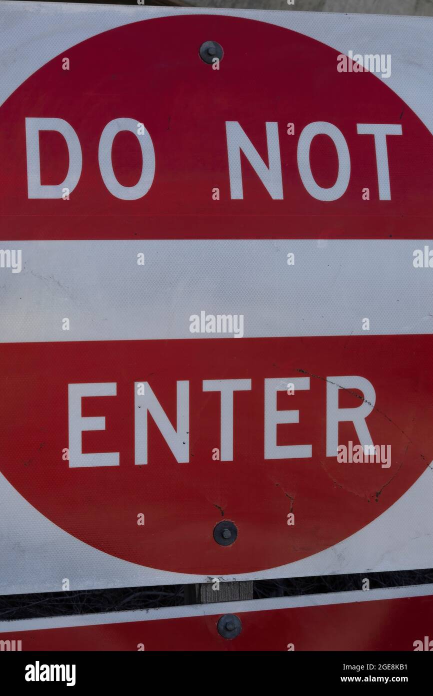 Wrong way sign at side of highway hi-res stock photography