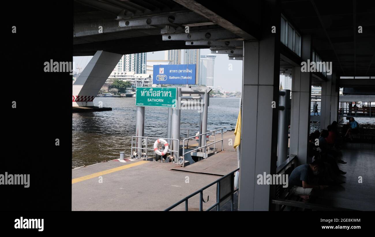 Sathorn Pier beneath the Taksin Bridge,on the Chao Phraya River Sathorn Road in Bangkok, Thailand. Pandemic Lockdown Stock Photo