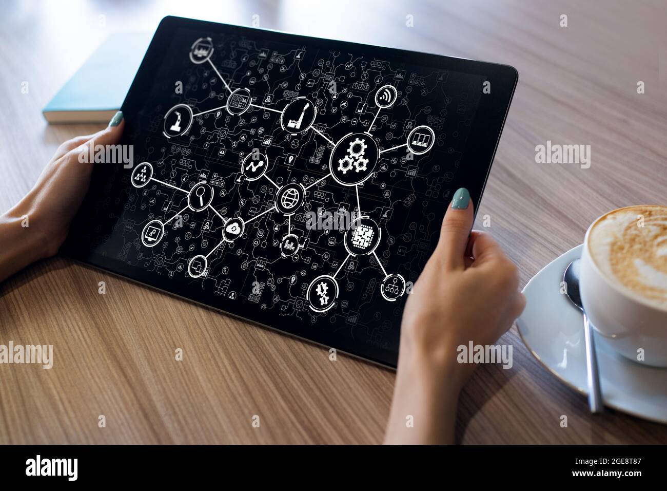 Business and industrial process automation and IOT, internet of things on device screen. Smart industry Stock Photo