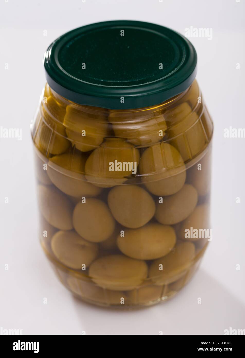 Green olives in glass jar Stock Photo Alamy