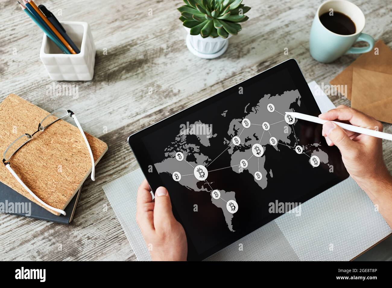 Bitcoin world map and blockchain technology concept on screen Stock Photo