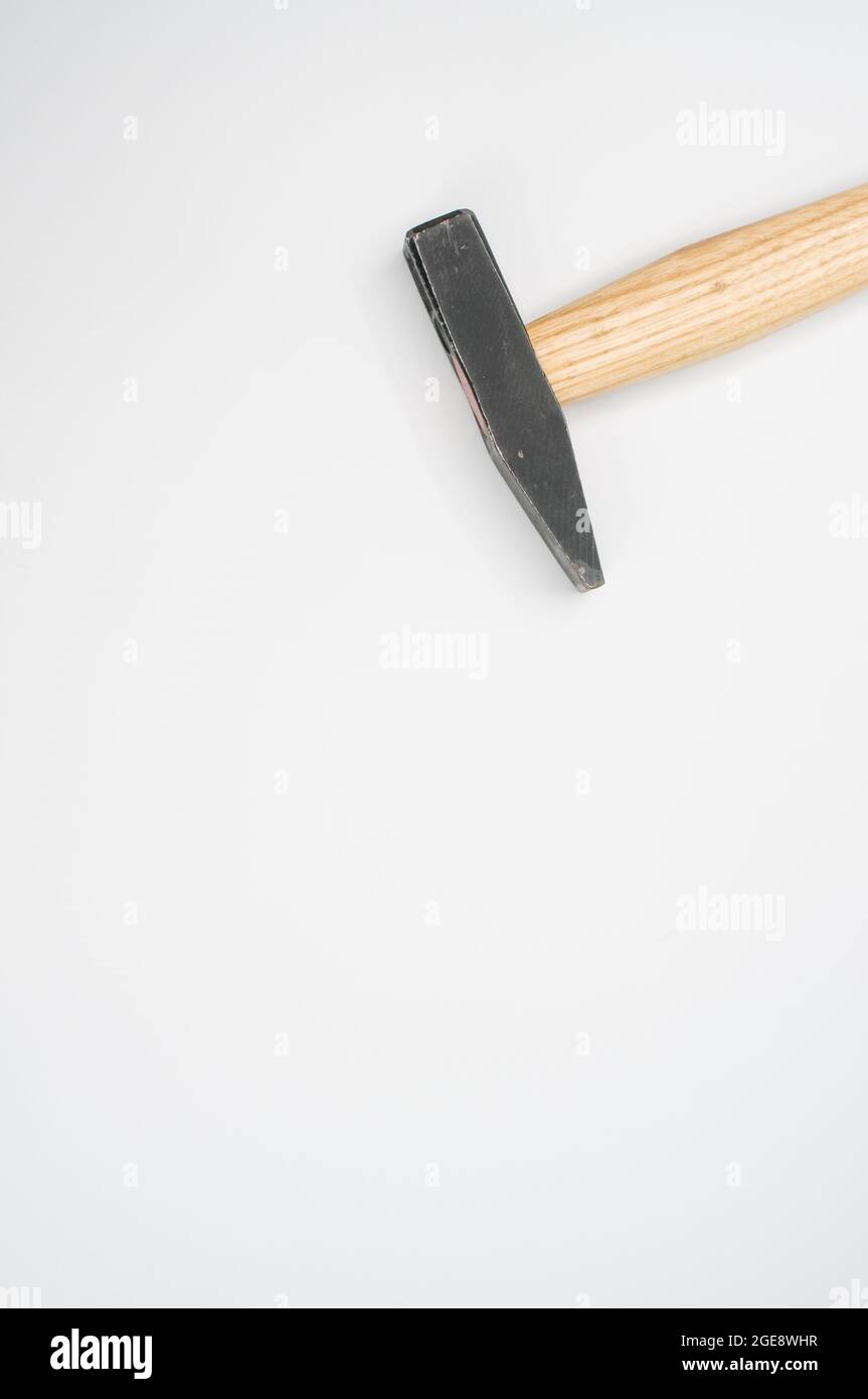 Machinist hammer with a wooden handle isolated on a white background ...