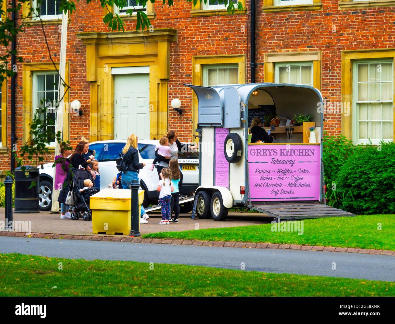 Grey's Kitchen mobile café at Kirkleatham museum Redcar crowded with mothers and children during the summer holidays Stock Photo