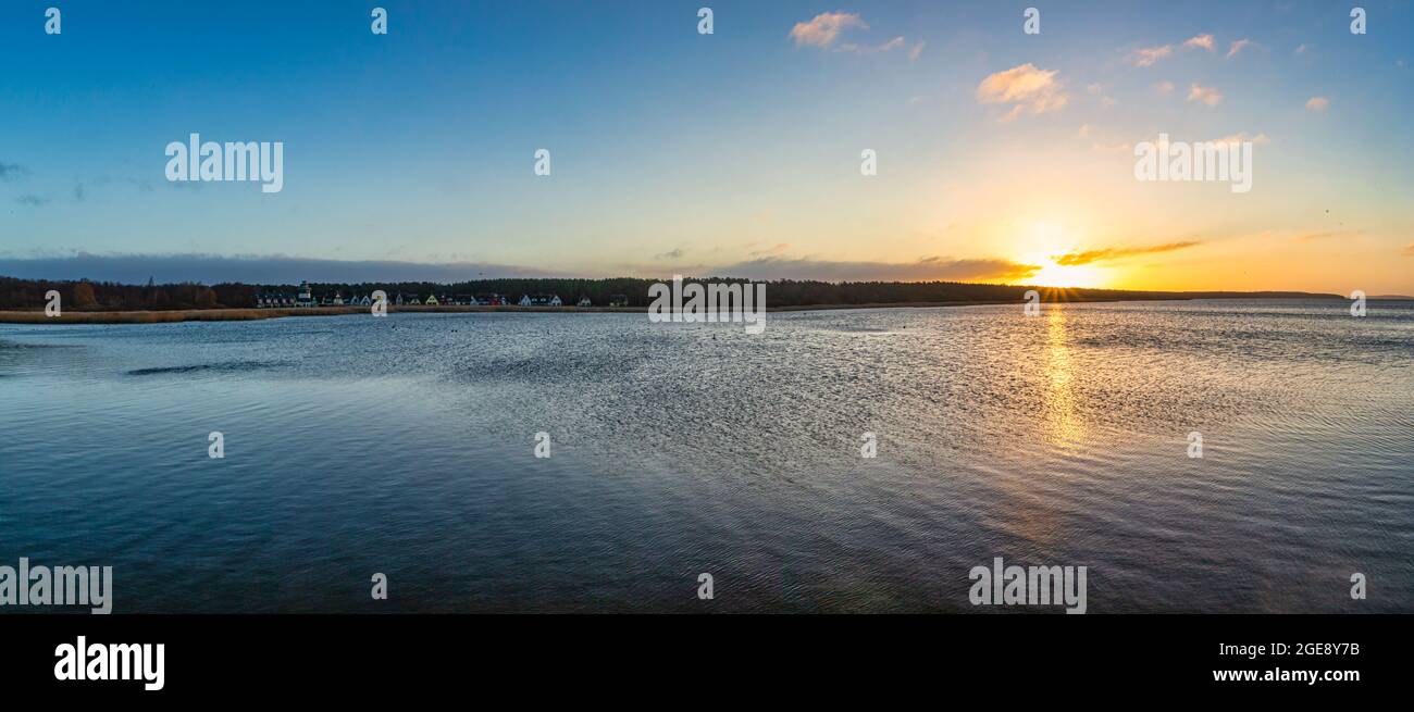 Panorama of cloudy sunset into North Sea Stock Photo
