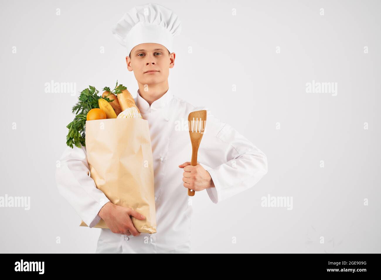 chef with a package of fresh food delivery kitchen work Professional ...