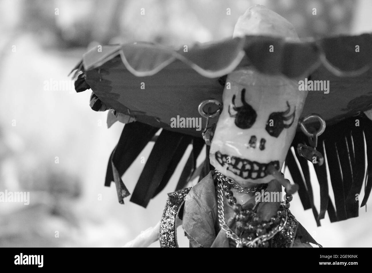 Greyscale shot of a traditional doll with traditional costume Stock Photo