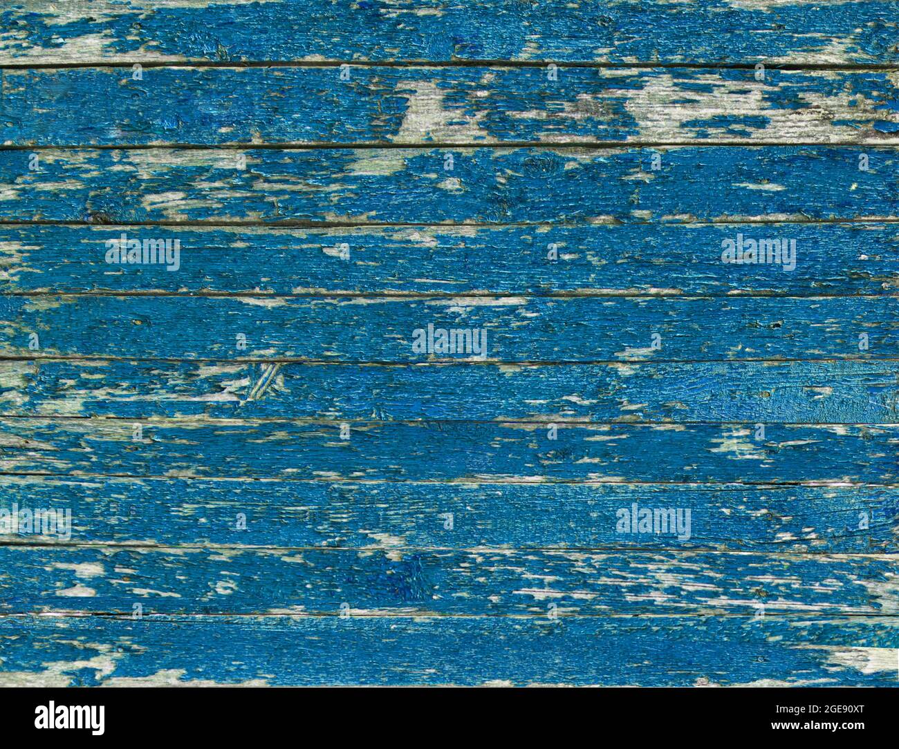 Color-Peel wood texture. Old wooden painted light blue rustic fence, paint peeling background Stock Photo