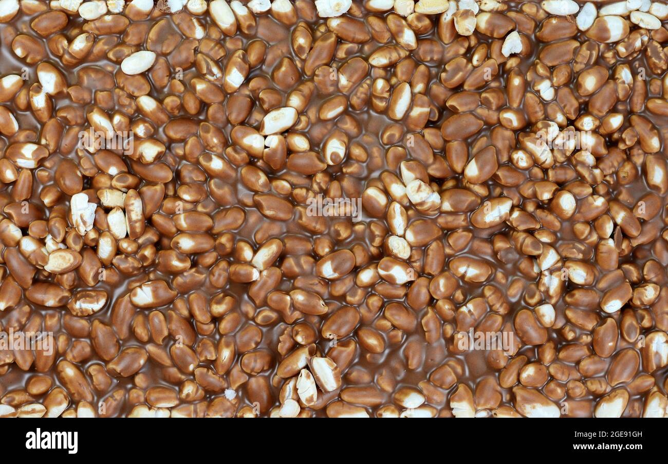 Chocolate with puffed rice, texture, background Stock Photo - Alamy