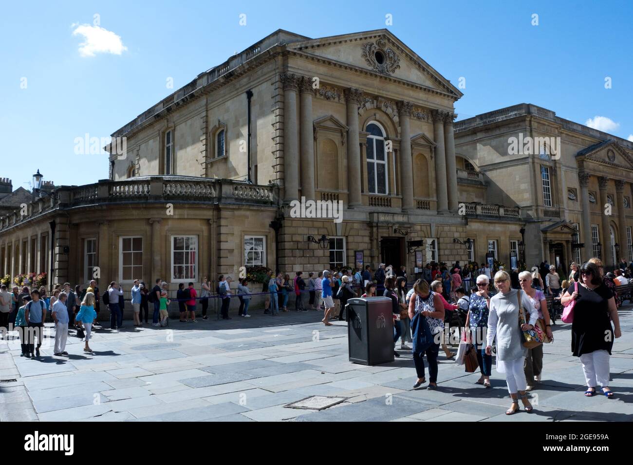 People Queue Outside The Roman Baths Complex In The City Of Bath ...